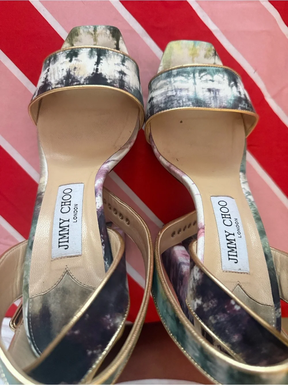 Jimmy Choo striking jimmy